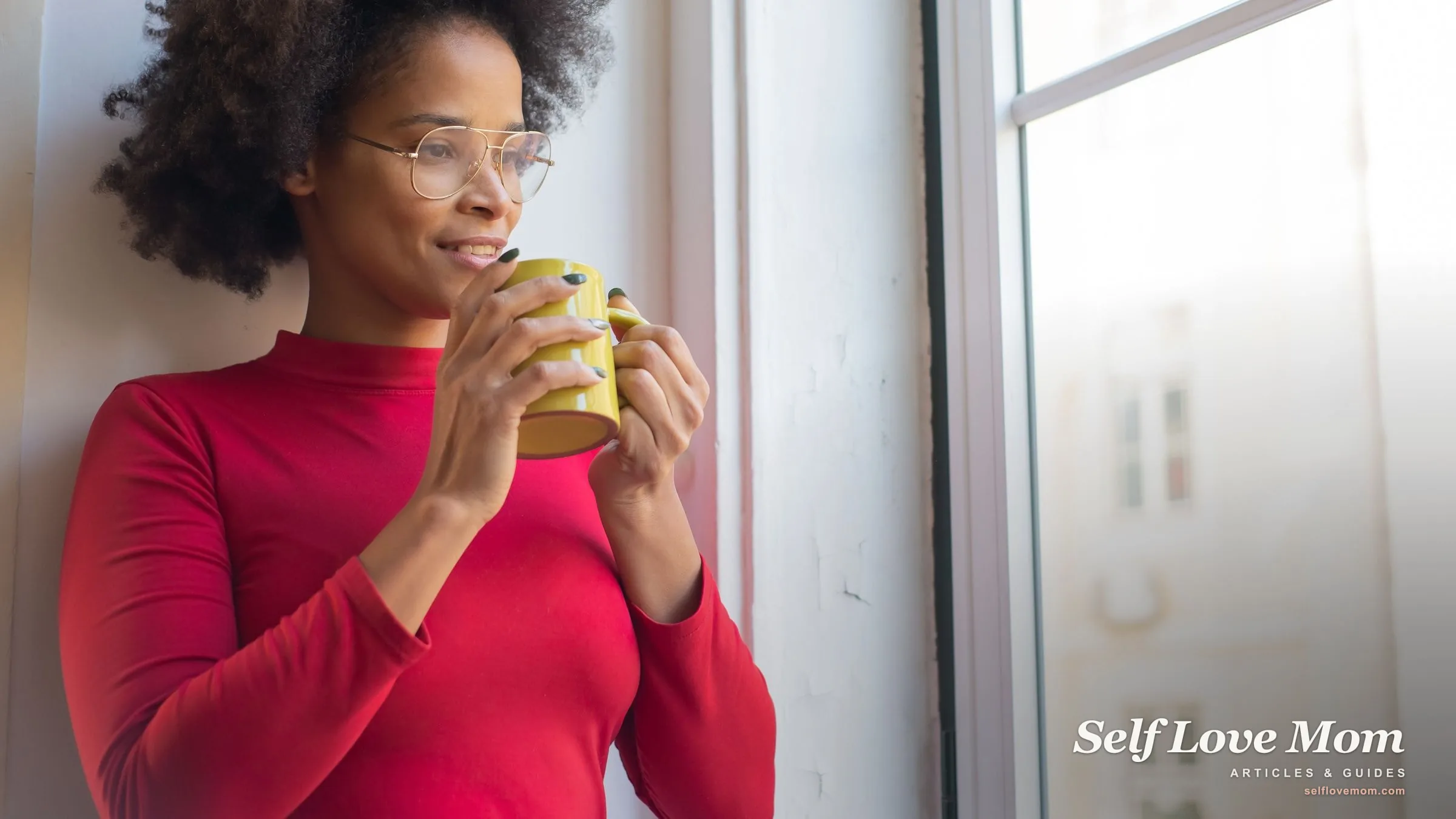 A woman in glasses holds a warm mug and gazes thoughtfully out a window, reflecting the quiet weight of depression at home.