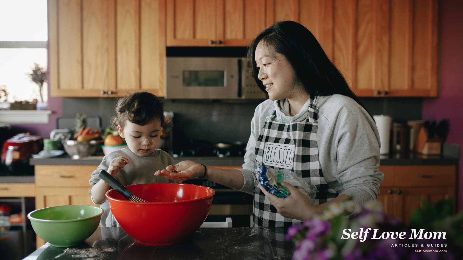 A single mom and her daughter share a calm moment in the kitchen between phone calls about emergency loan options