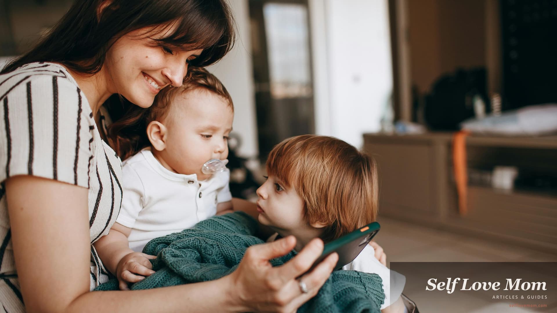 A single mom in Michigan sits close with her two children at home, the kind of family moment Michigan's 8+ grant and aid programs in 2026, FIP cash, SNAP food, MSHDA Section 8, and the Tuition Incentive Program, are designed to support.