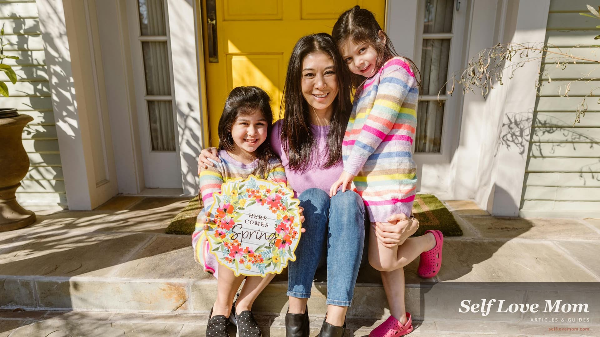 Tennessee single mom sits on her sunny front porch with her two young daughters on a spring morning, the kind of small joyful moment Tennessee Reconnect, THDA down payment help, and Families First exist to make possible.