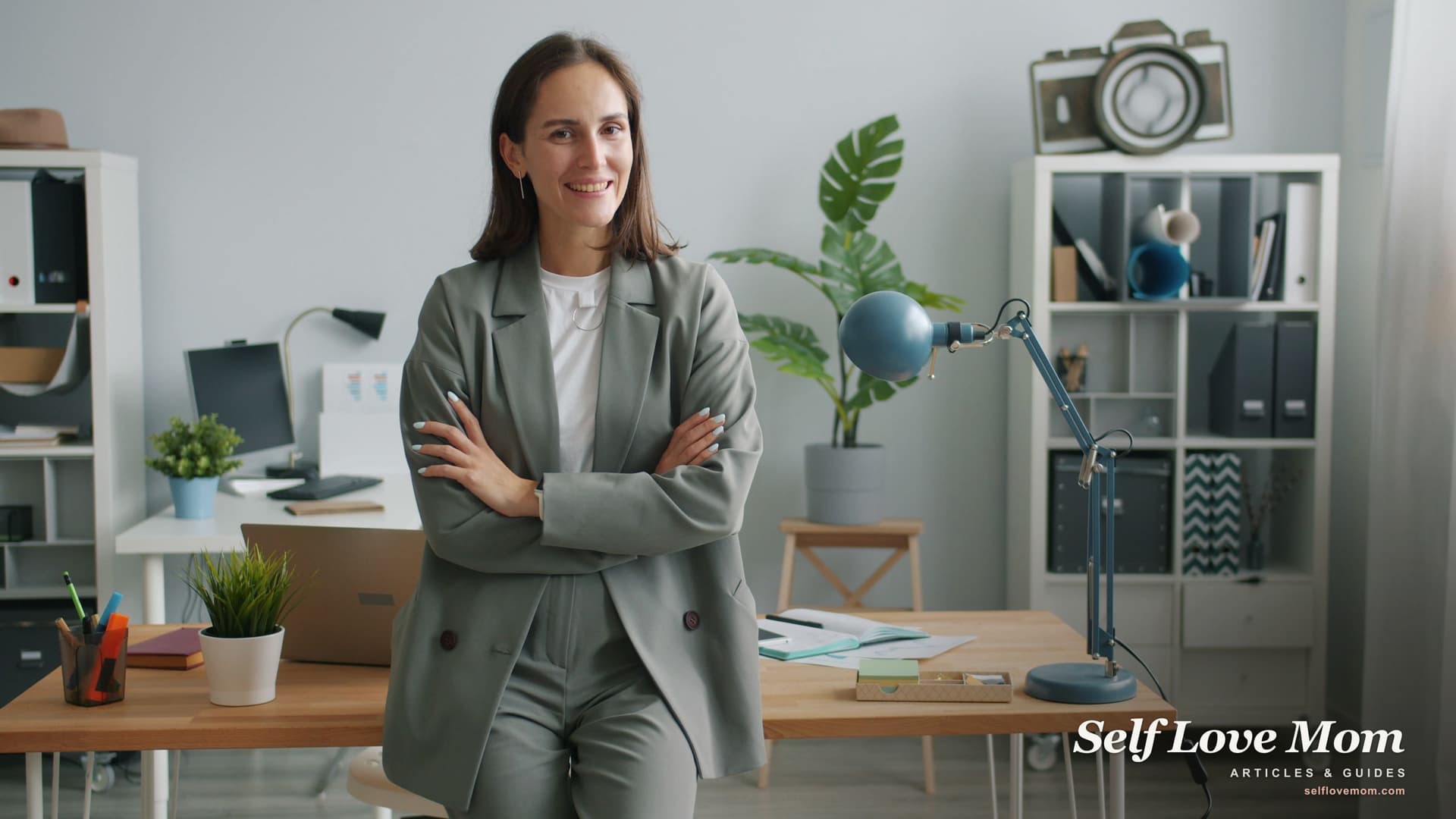 A confident professional woman in a blazer smiles in a modern office, representing high-paying careers.