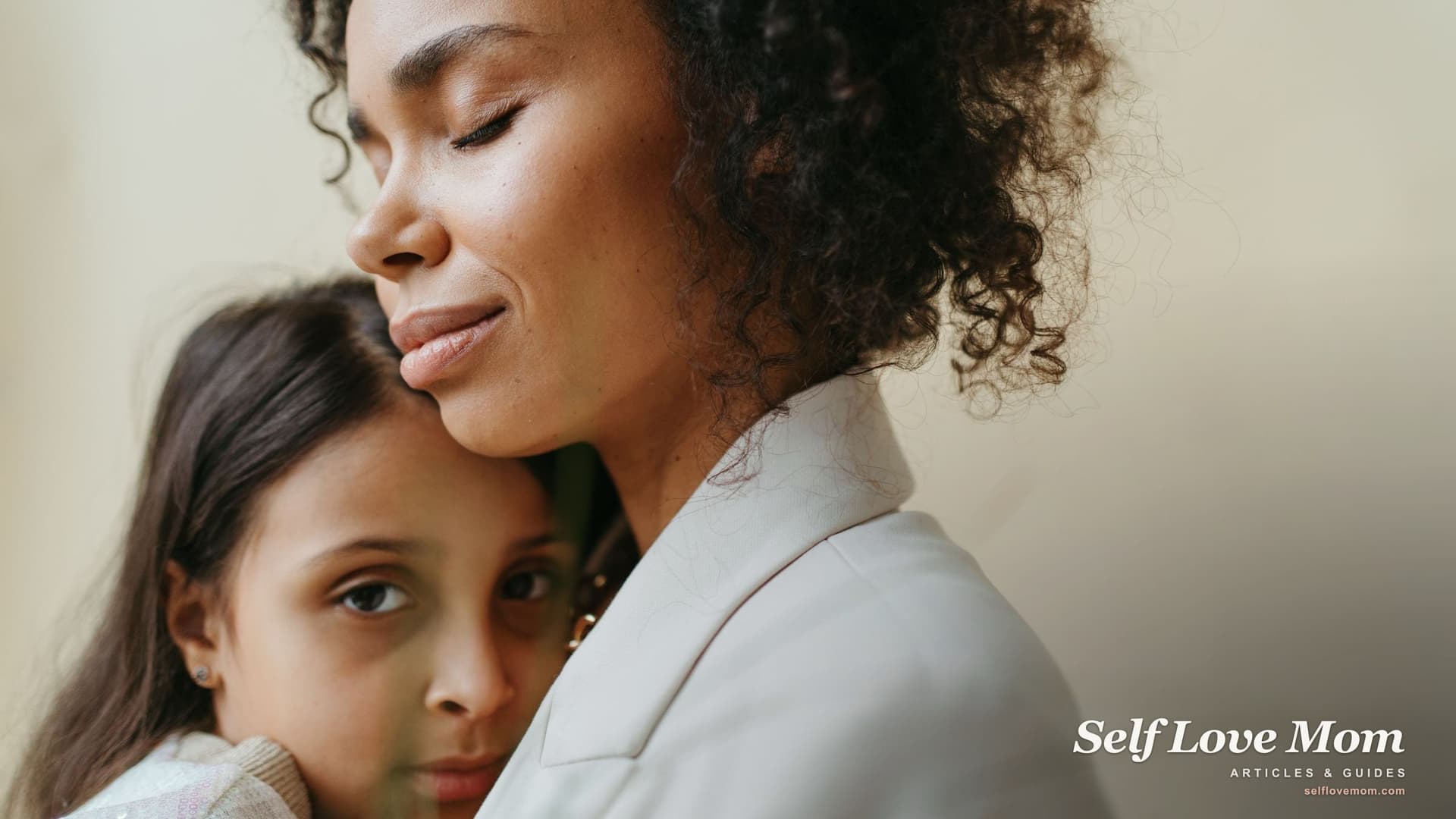 A mother holds her daughter close with her eyes shut, the protective moment when a parent starts asking a court for help.