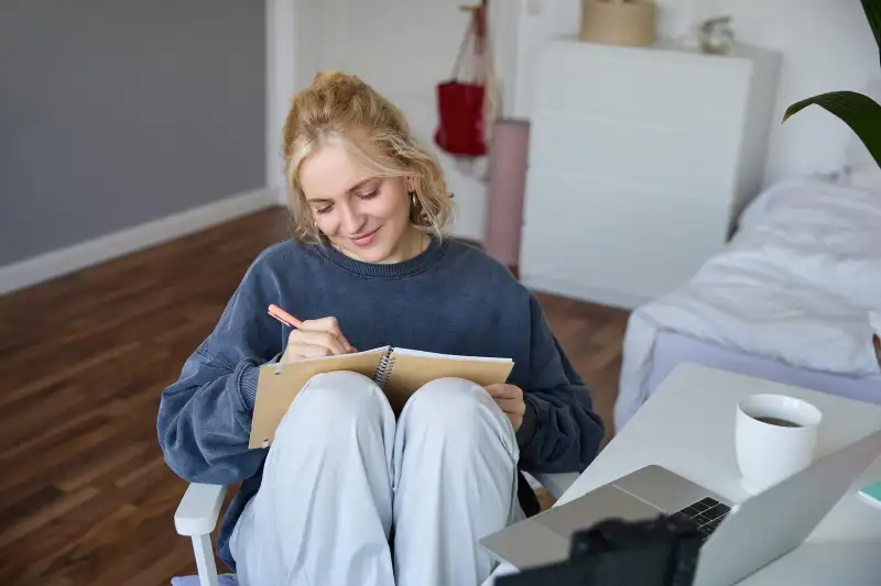 Single mom journaling at home as part of self care for single moms