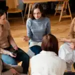 Therapy for Single Mothers – group support session with women sharing experiences