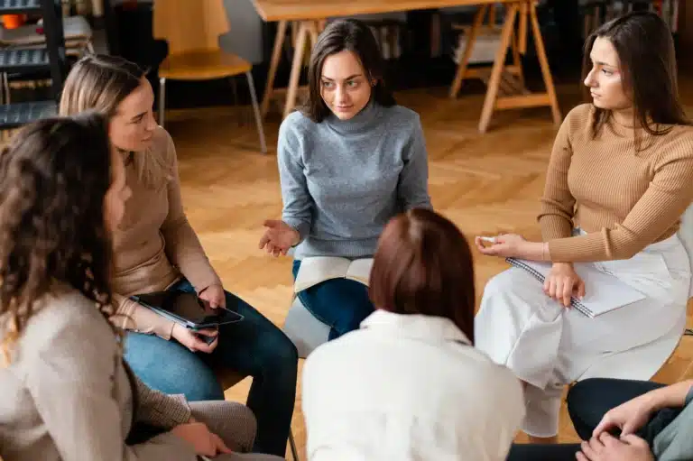 Therapy for Single Mothers – group support session with women sharing experiences