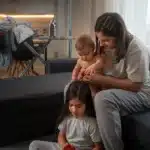 Single mother challenges: Taking care of children while managing household tasks. A common scenario for many single mothers balancing family duties