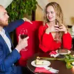 A young couple enjoying a moment together at a restaurant, symbolizing the journey of single motherhood and dating, finding love, and achieving balance in life.