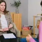 Therapist for Moms providing emotional support and counseling during a therapy session