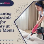 Stay-at-home mom cleaning the couch with a vacuum cleaner, following a cleaning schedule for stay at home moms.