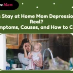 Stay-at-home mom looking tired while holding her baby, reflecting the challenges of stay at home mom depression.